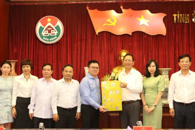 Đoàn công tác của Báo Nhân dân thăm và làm việc tại Đắk Nông
